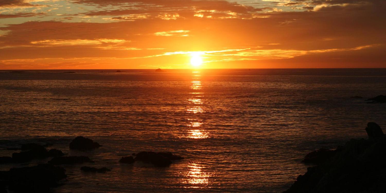sunrise over the water