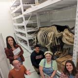 5 students at the Denver Museum of Nature and Science with fossils