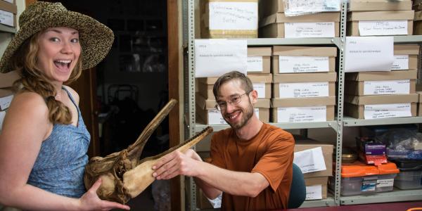 student and dolphin skull