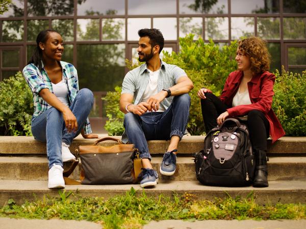 3 students talking