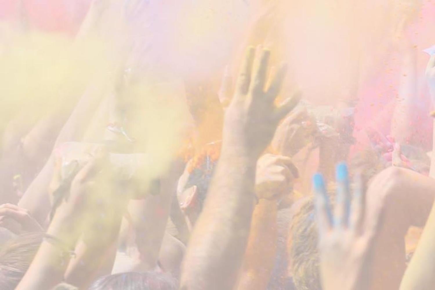Celebration of Holi with multiple colored powders