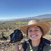 Helen on a field with obsidian block