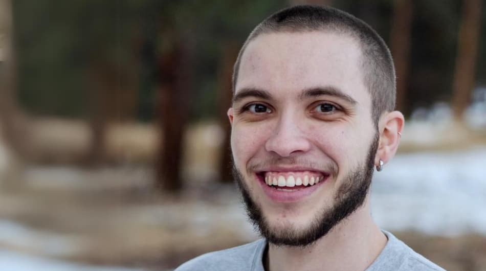 Derek Bowers smiles at the camera 