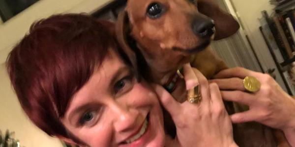 Michelle Medal with dachshund