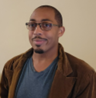 An African American man with glasses. 