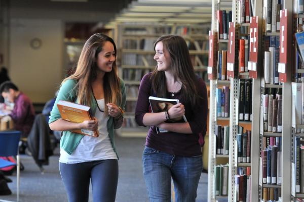 two girls in library