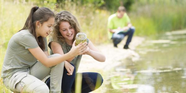 2 girls studying ecology