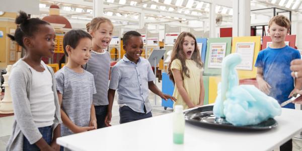 kids watching a science experiment