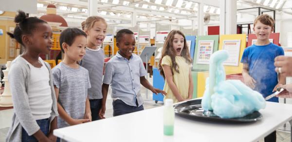 Kids watching a science experiment