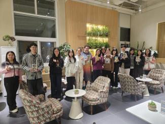 students and faculty participate in a book club in Beijing, China