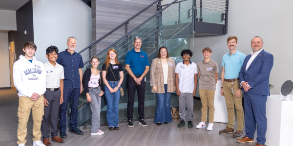 Group photo of science fair participants with fair partners 