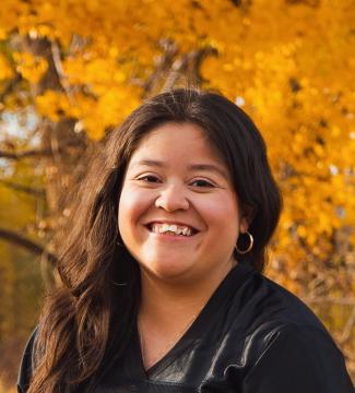 Headshot of student assistant, Rosa Chavez, smiling at camera.