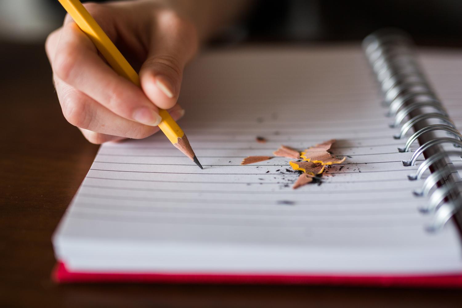 Hand writing in a notebook