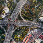 Aerial view of a intricate highway infrastructure of a dense urban landscape in a major city.
