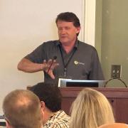 Richard Ashmore, CU Denver, presenting "Building AI-Native Assignments: Teaching Students to Work and Think With AI" at COLTT 2026.