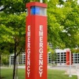 Red emergency phone station on campus 