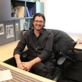 Dr. Ryan Crewe at his desk