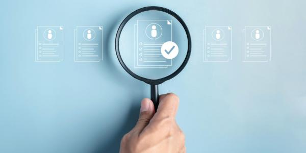 magnifying glass over document