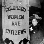 suffragette sign that reads "Colorado women are citizens" 