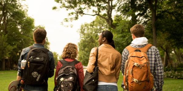 Students walking down a campus path