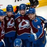 The Aves Hockey team huddled together after scoring