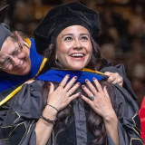 Stock photo of a woman graduating