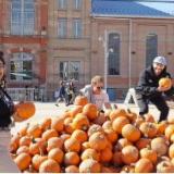 A pile of pumpkins in front of the Tivoli