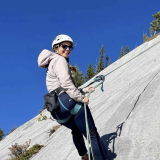 stock photo of someone rock climbing