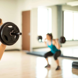 A woman dead lifting weights