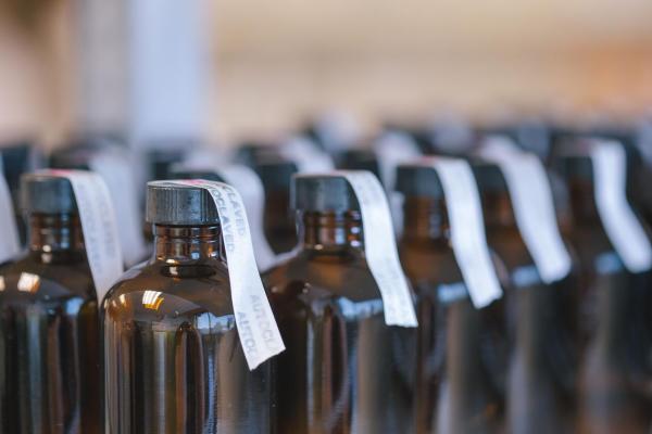 rows of brown bottles of biology materials
