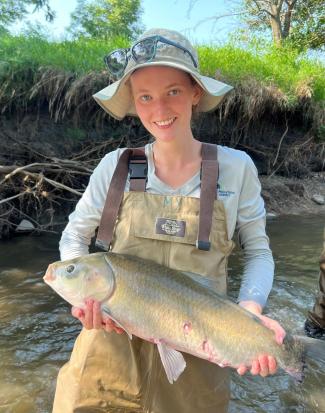 Martha Young holding a large fish