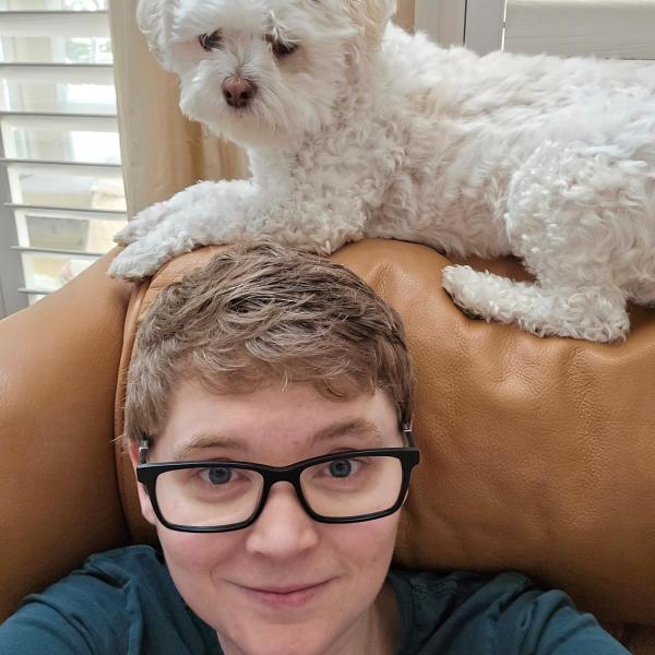 photo of Cat graber and small white dog