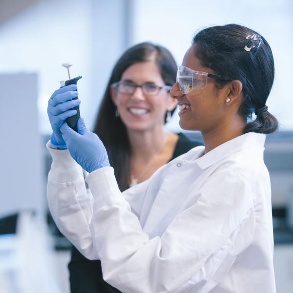 Dr. Mosier with a student in the lab