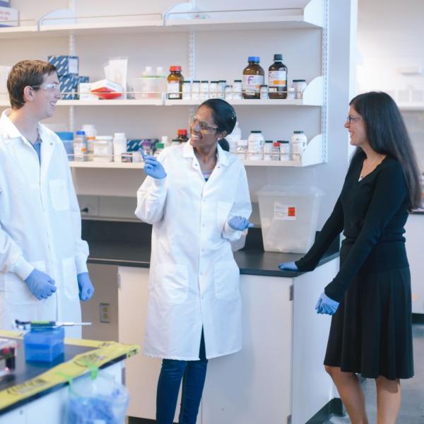 Dr. Mosier with students in the lab