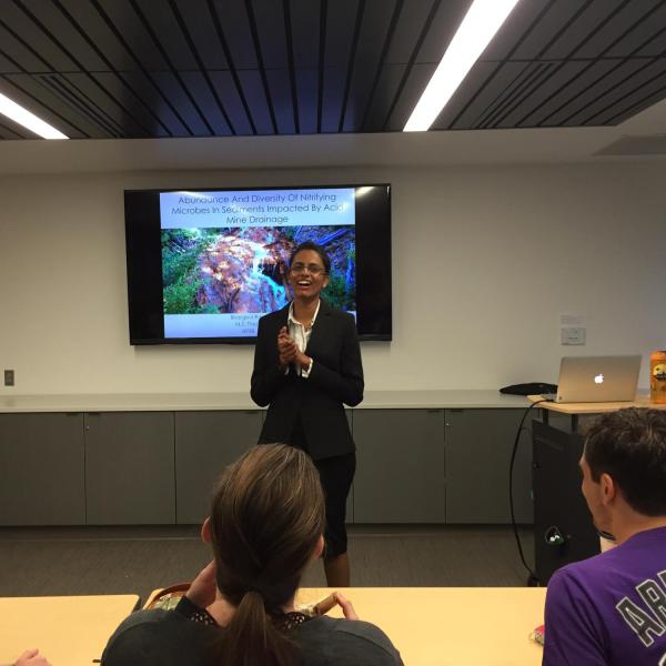 Student researcher presenting on research