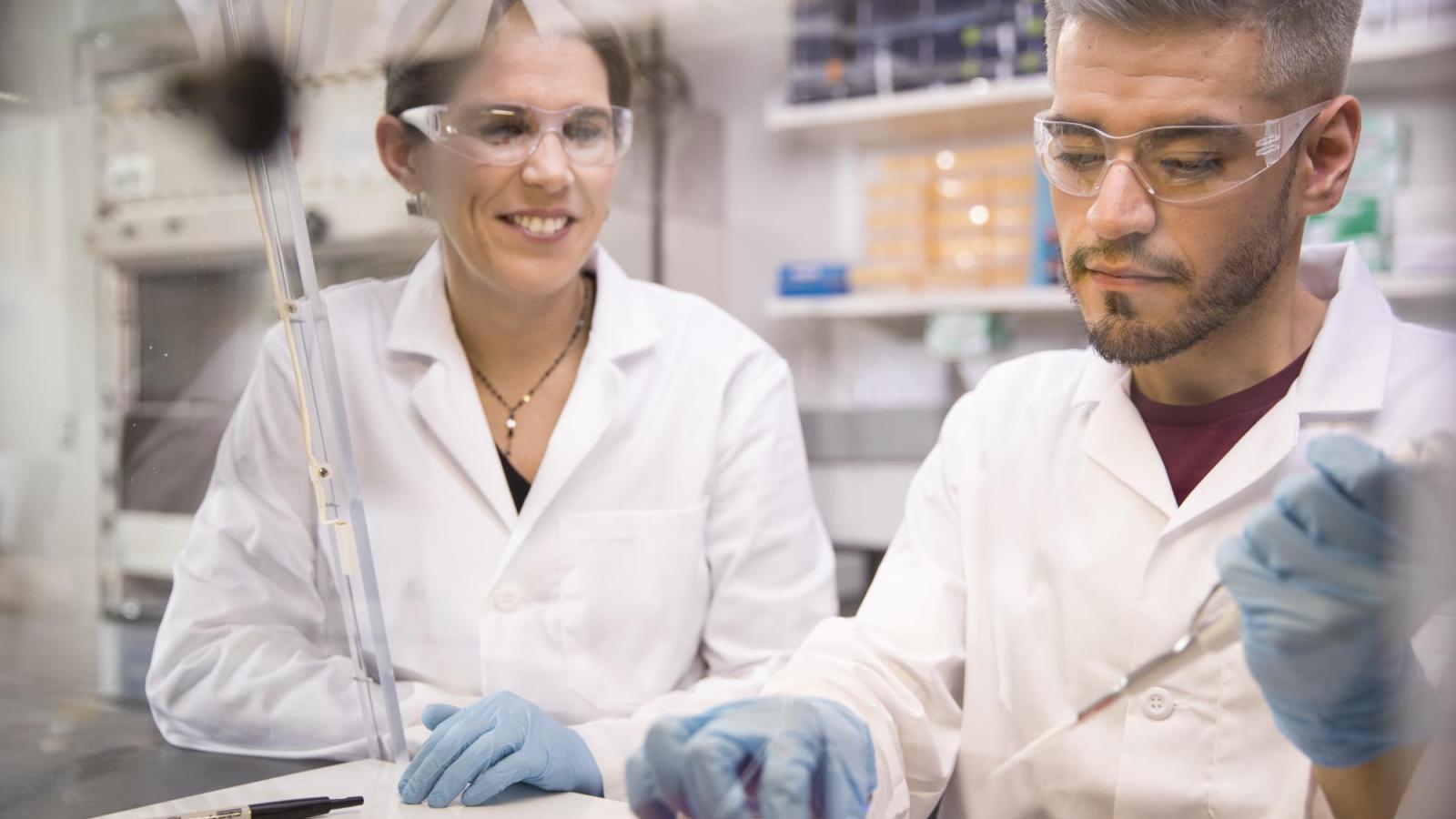 Dr. Annika Mosier with a student in the lab