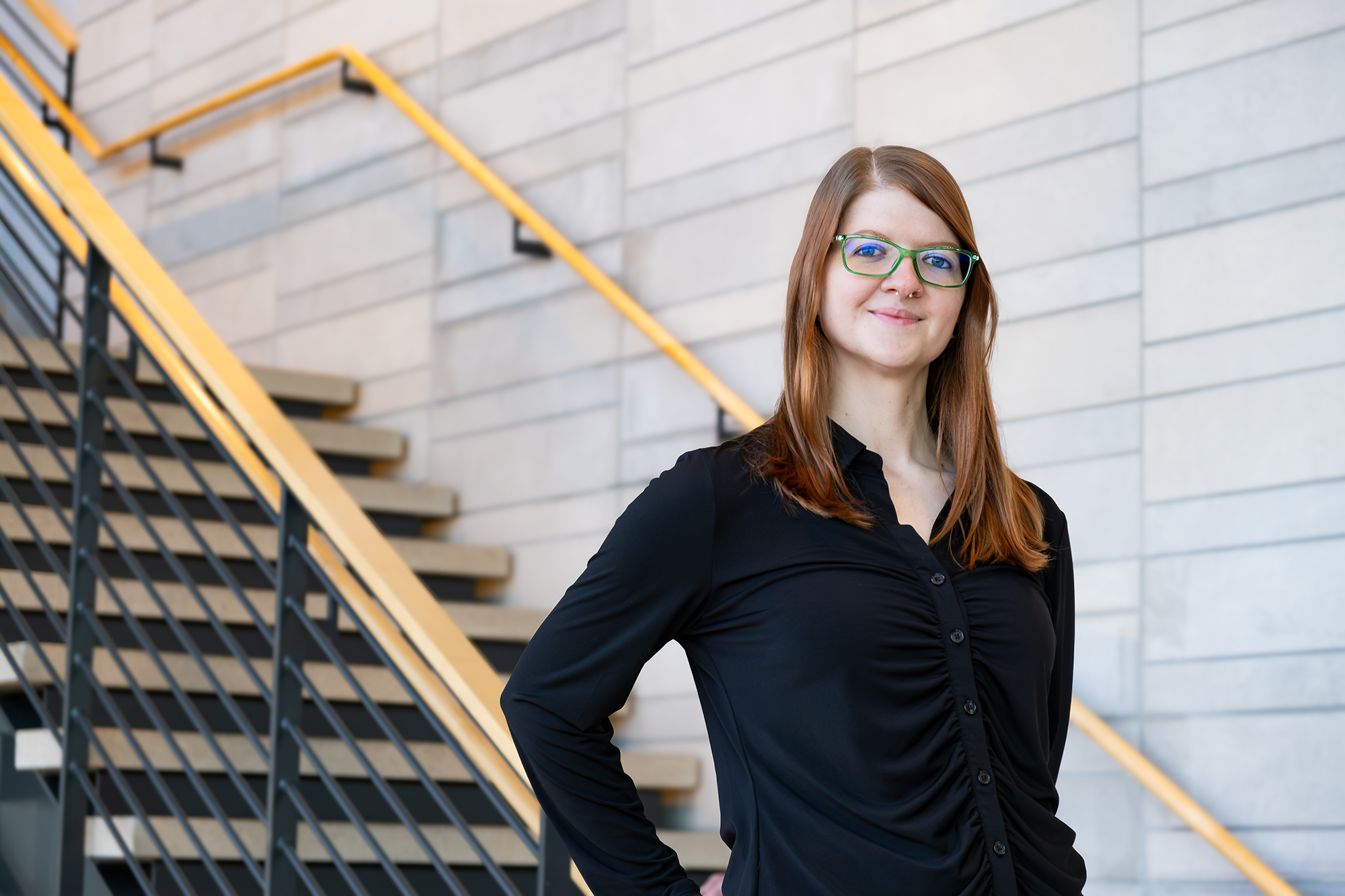 Jami Helmig stands in the Spear Gallery