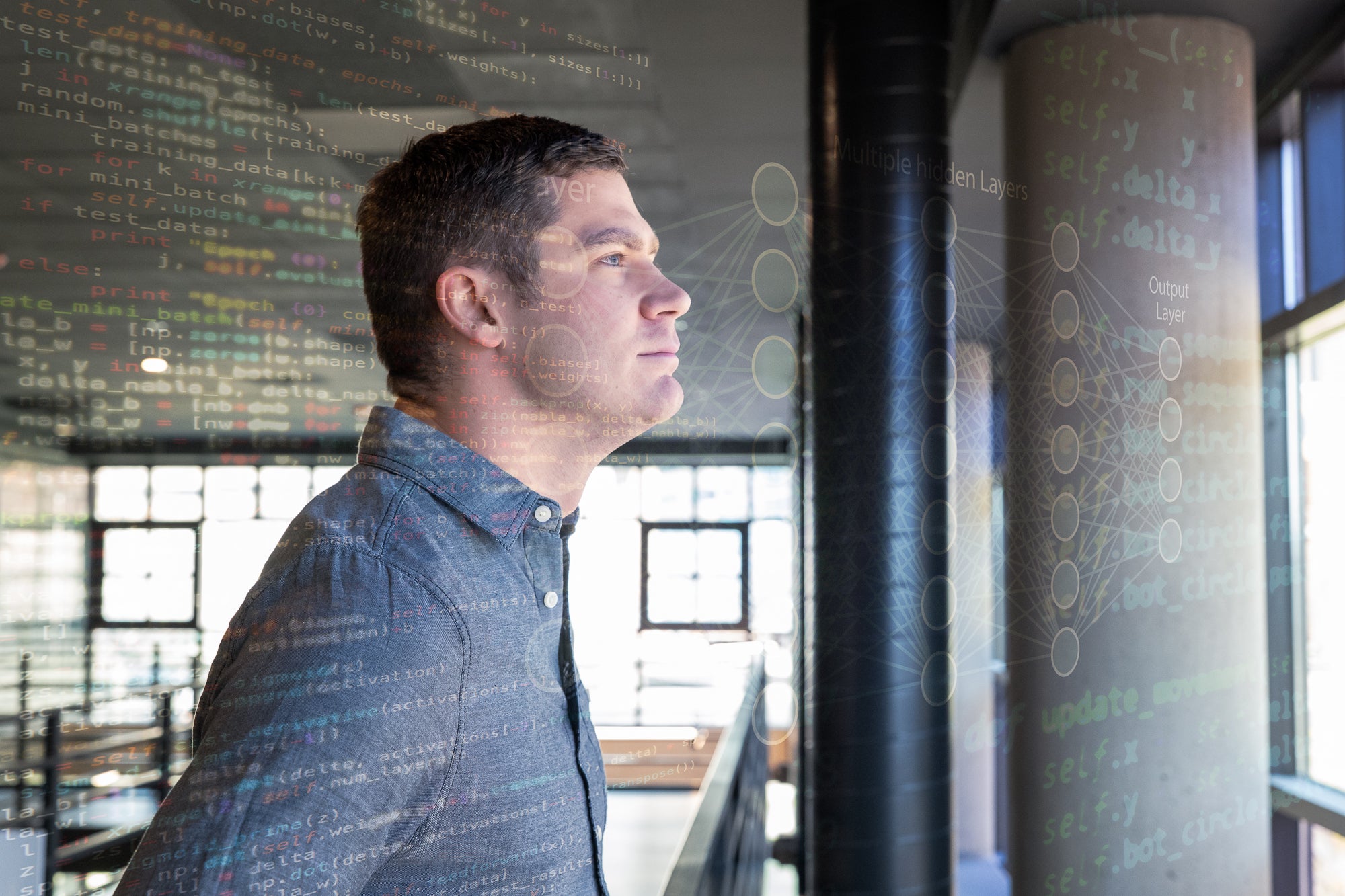 Philip looks out a window with data flying past him