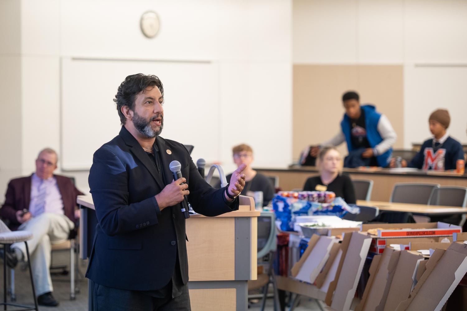 CU Denver Alum and Denver Elections Clerk Paul Lopez talks in classroom