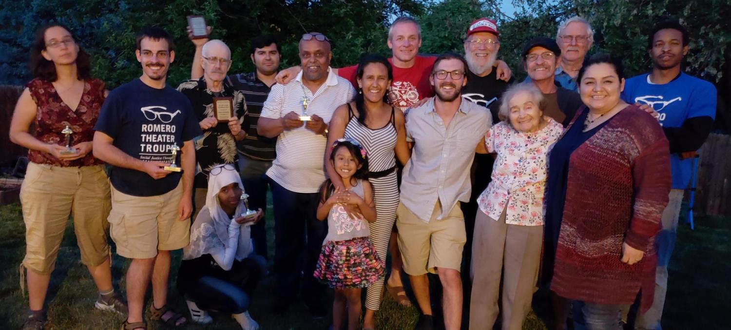 Romero Troupe volunteers stand together