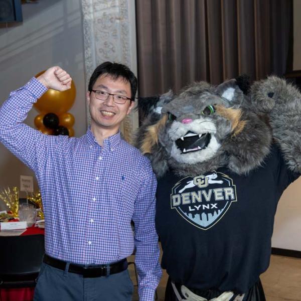 Guests pose with Milo