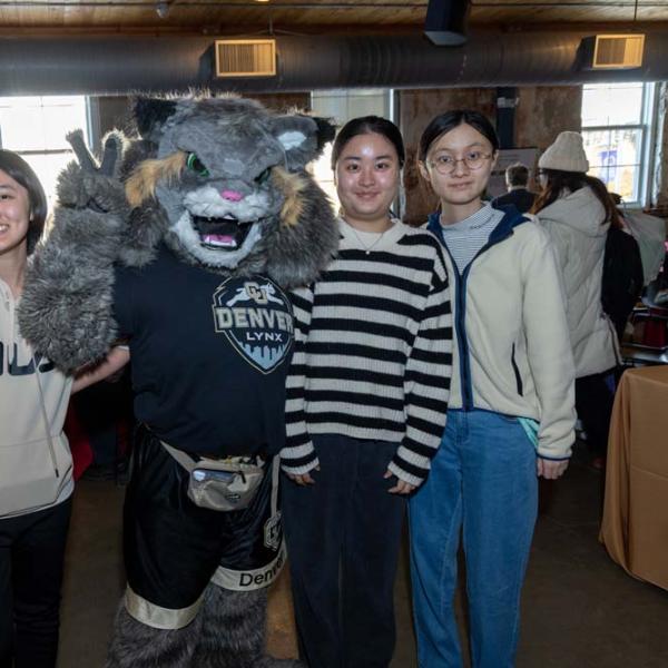 Guests pose with Milo