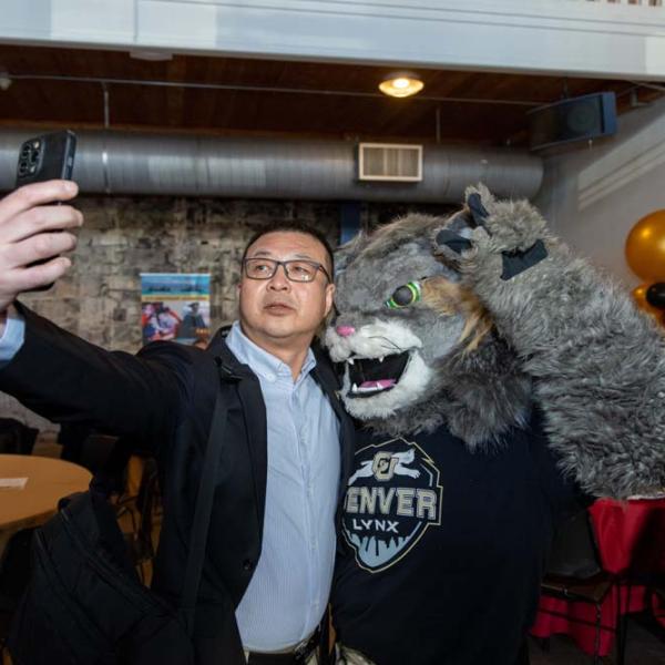 Guests pose with Milo