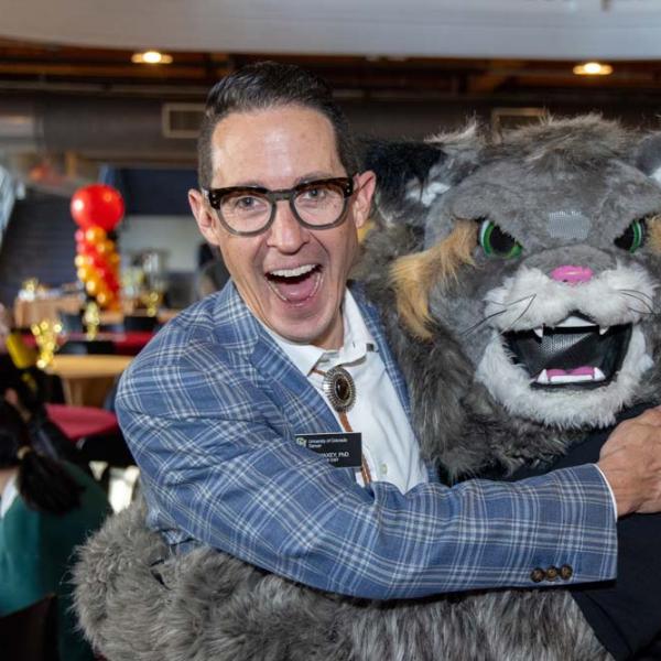 Guests pose with Milo