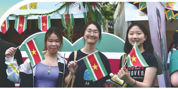 Chinese students holding flags