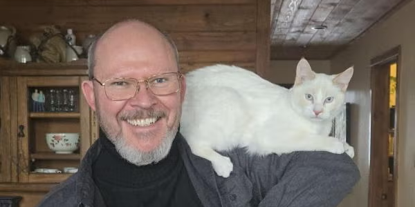 Dr. Christopher Beekman with cat