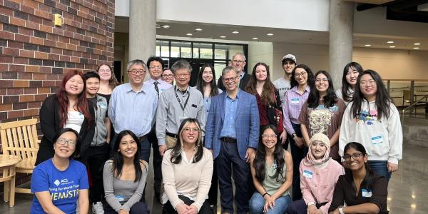  Student presenters, volunteers, and faculty with Prof. Todd Martinez at the student poster session