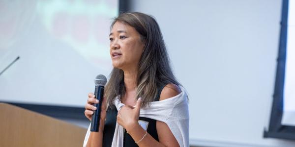 Vivian Shyu, PhD, director of education and training at CU Denver’s Center for Psychedelic Research, speaks to new faculty.