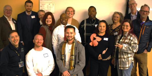 A group of folks involved with the Colorado Prison Education Program, including those from CU Denver
