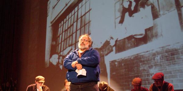 Romero Troupe actor monologues on stage